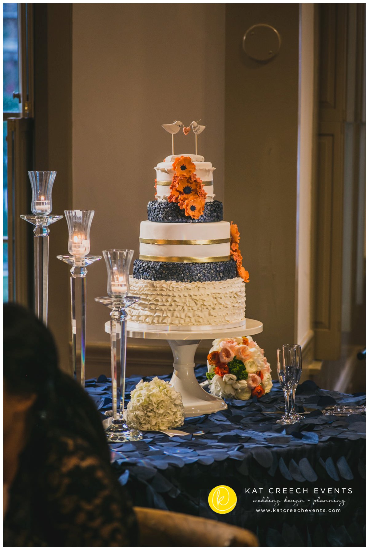 ivory, white, and coral wedding cake | unique wedding cake | bird cake topper | ruffled wedding cake | Kat Creech Events