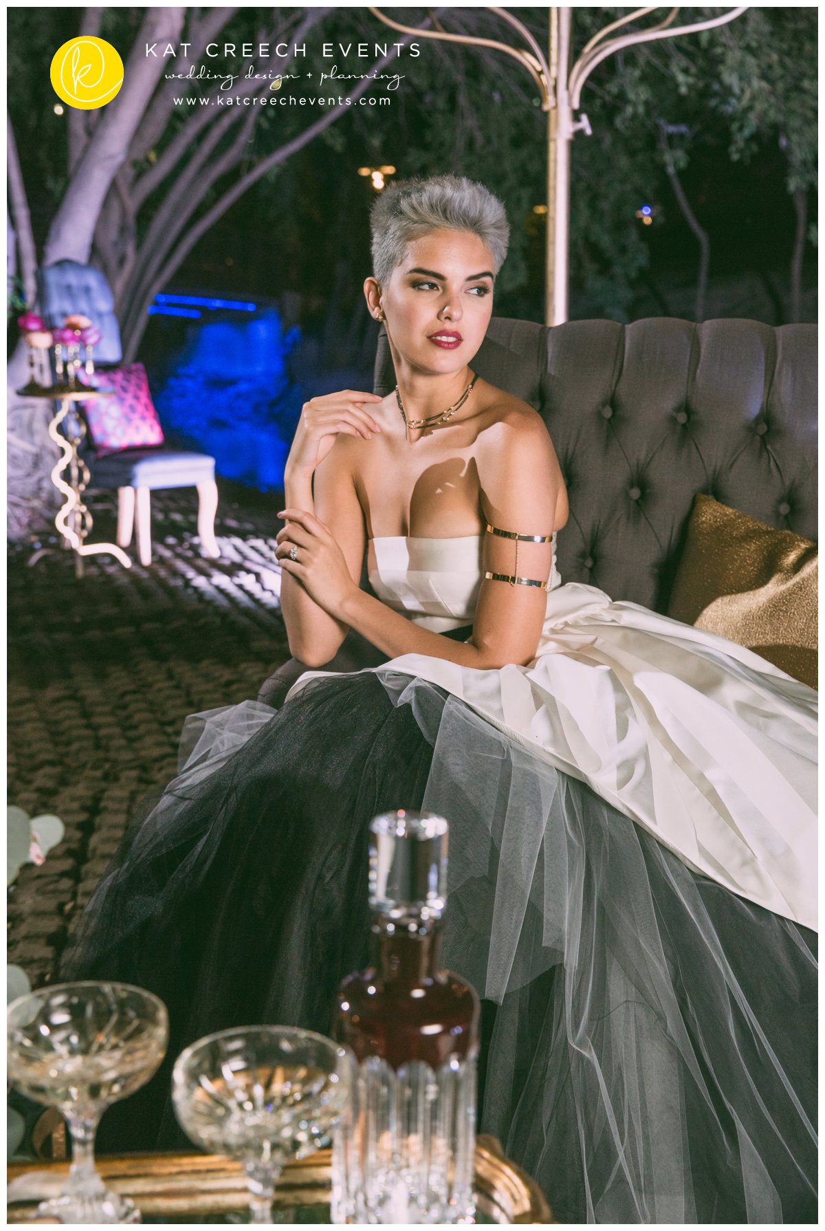 gold jewelry |white and black wedding dress |tufted lounge romance on the bayou |kat creech events | wedding stylist 